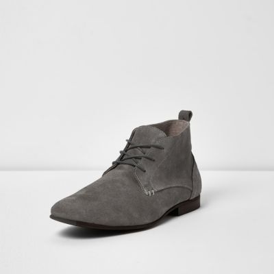 Grey suede lace-up boots